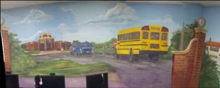 Mural depicting WPA era school and modern school bus.